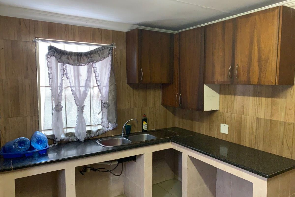 Charming 4-Bedroom Home with Additional Cottages in Rosettenville Rental Income R24k - Photo 5