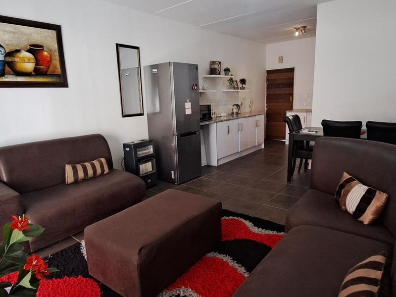 Modern 2-Bedroom, 2-Bathroom Apartment with Patio & Braai – Walk to Northgate Shopping Centre - Photo 9