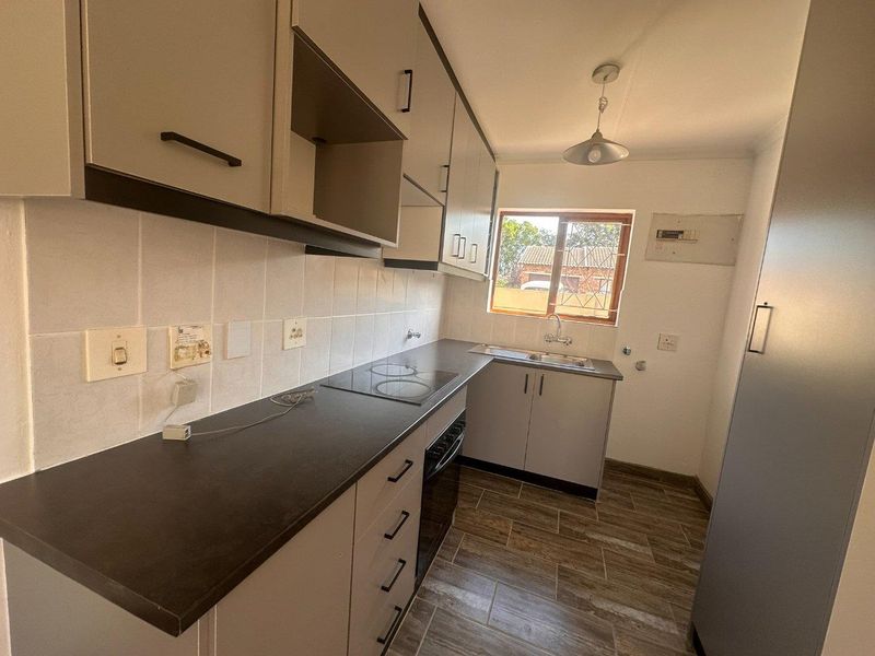 Charming 2-Bedroom Simplex with Private Garden – Secure & Well Located - Photo 4