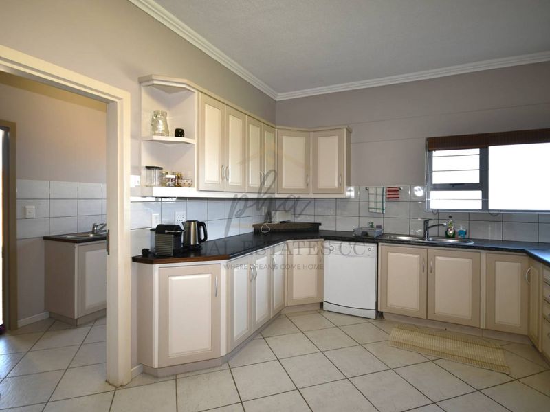 Exceptional Double-Story Beachfront Home with Unobstructed Sea Views - Photo 9