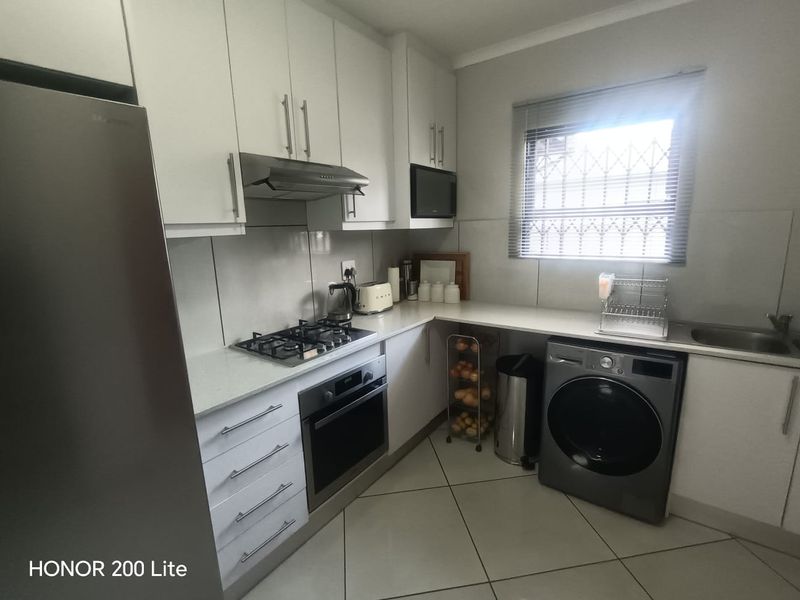 1. "Discover Your Dream Home in Mackenzie Palms!" 2. "Luxurious Living Awaits in This 3-Bedroom Gem!" 3. "Modern Comfort Meets Security in Mackenzie Palms!" 4. - Photo 8