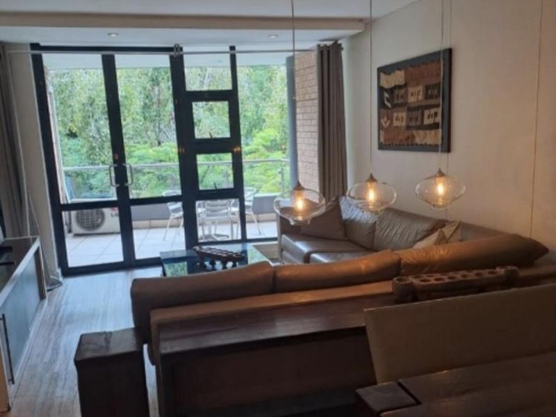 A BEAUTIFULLY FURNISHED TWO BEDROOM APARTMENT - Photo 1