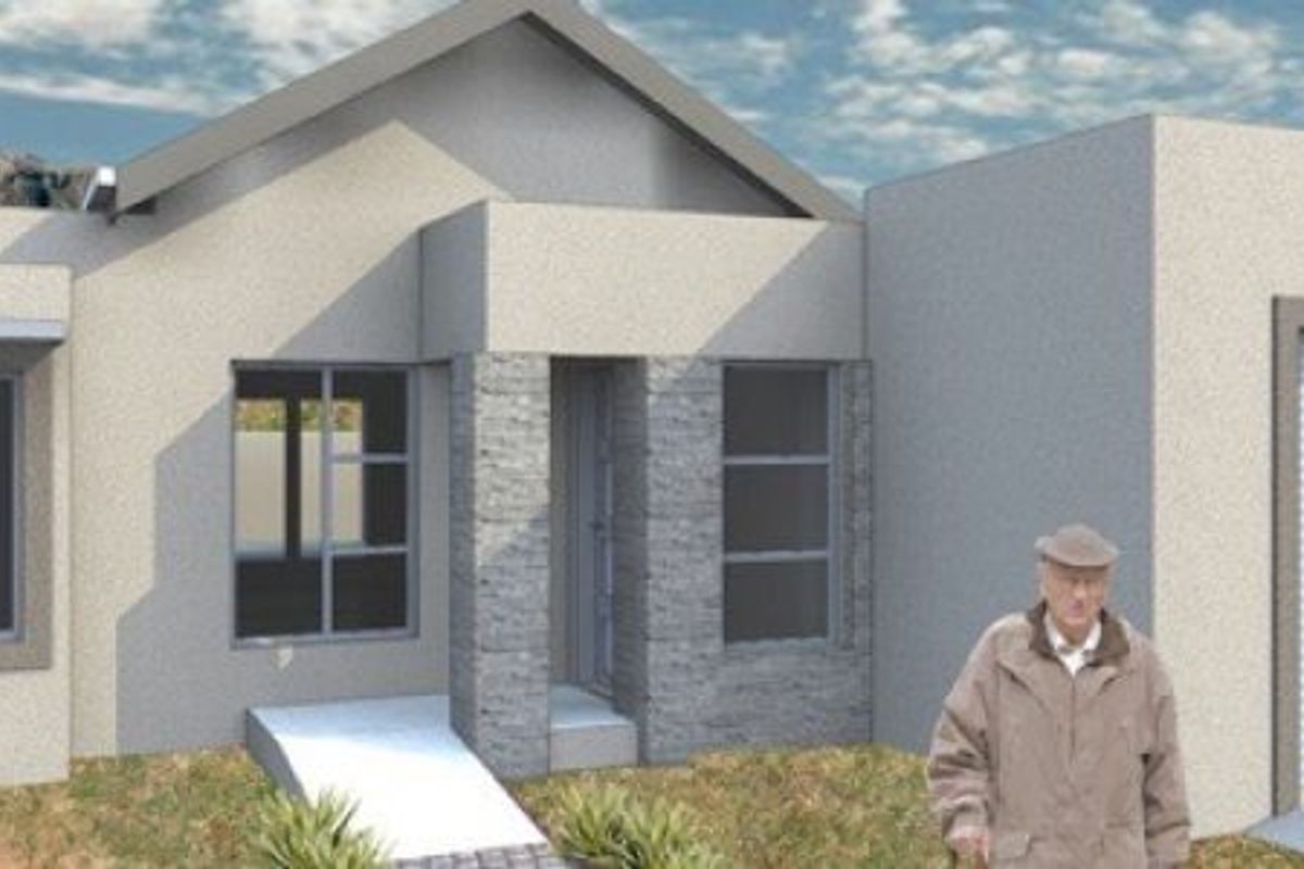 A modern residential front elevation featuring stone cladding accents, a single roller garage door, and clean architectural lines.