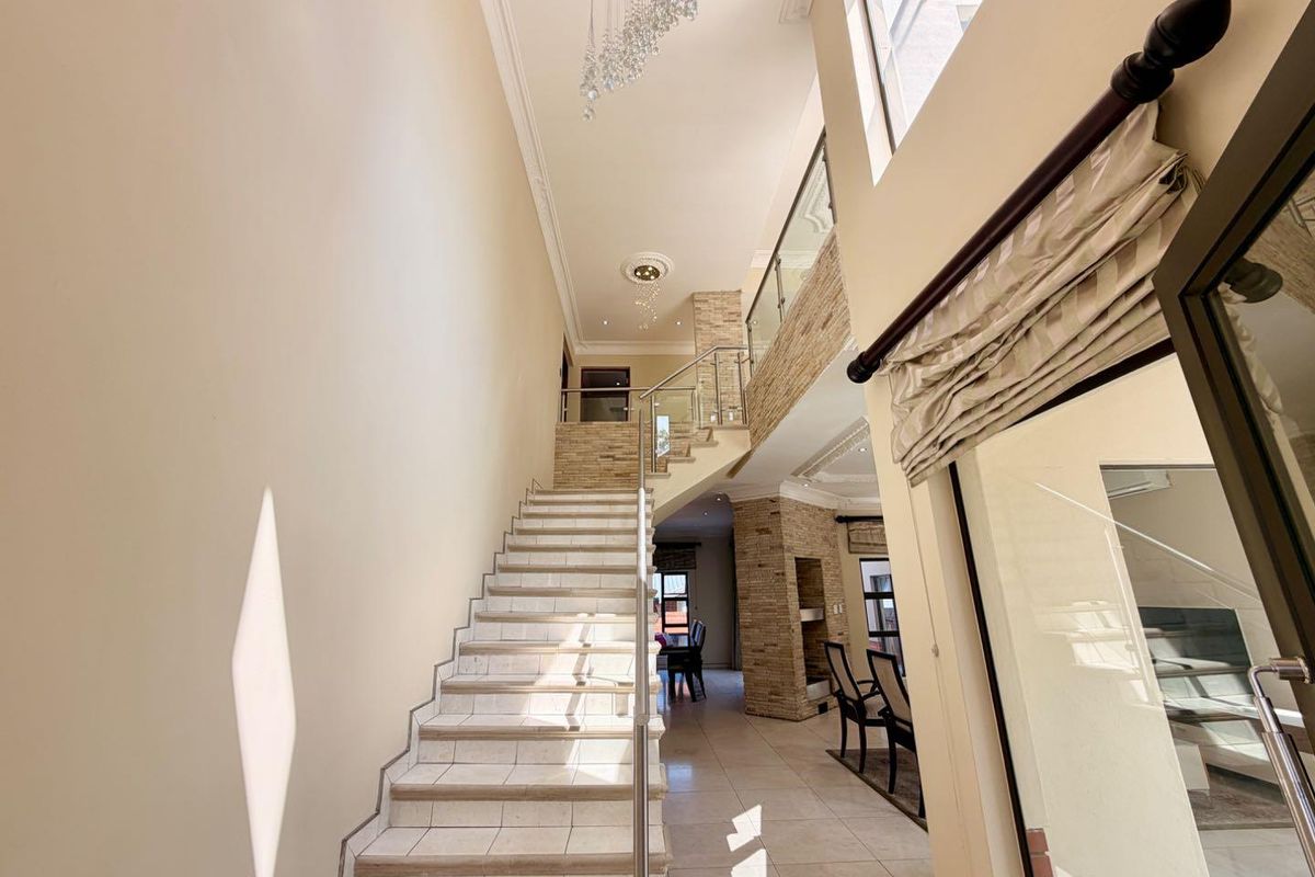 Five Bedroom Home For Sale in Waterfall Country Village Estate on a Corner Stand - Photo 5