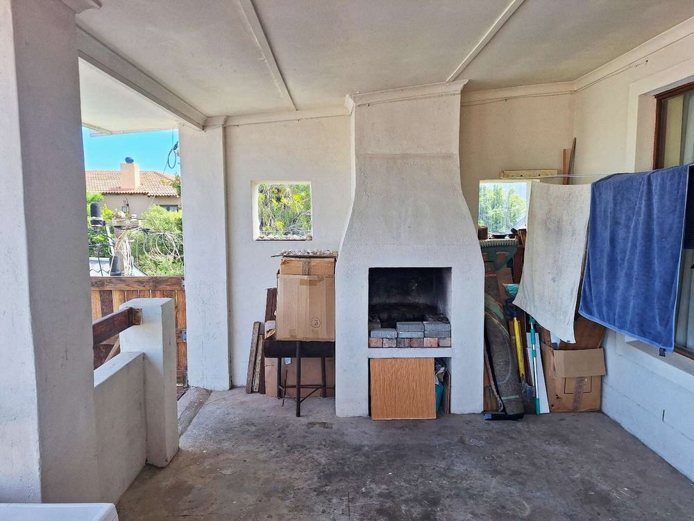 Covered braai area in front of main flat