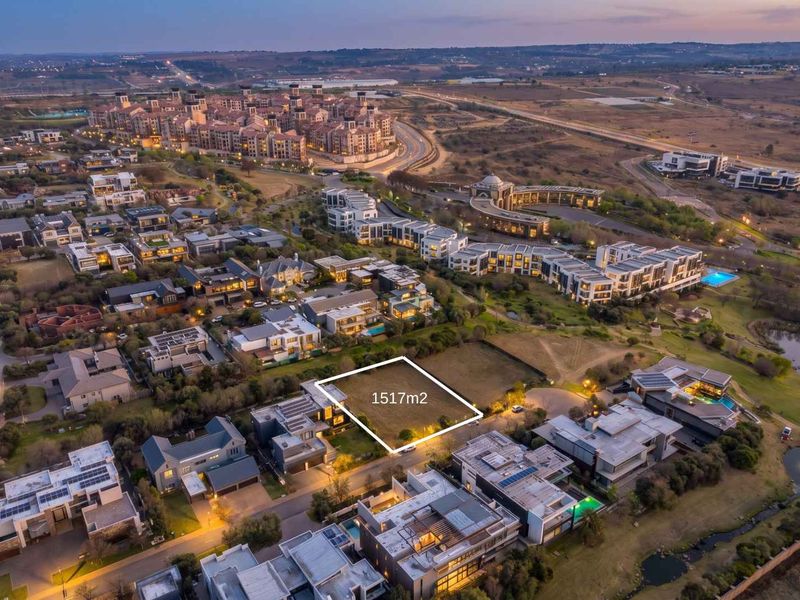 An aerial view of a 1517m2 vacant residential plot situated within a developed, modern residential estate.