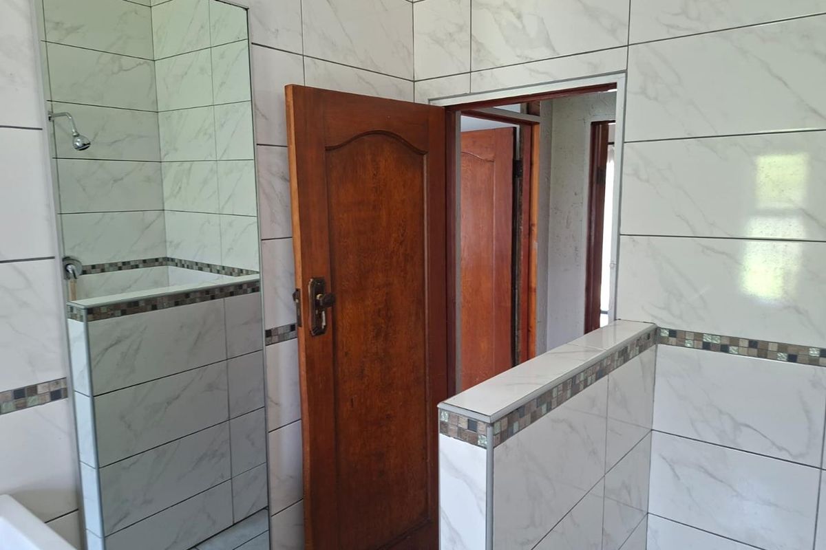 Corner Stand in Fairly Busy Road - Photo 3