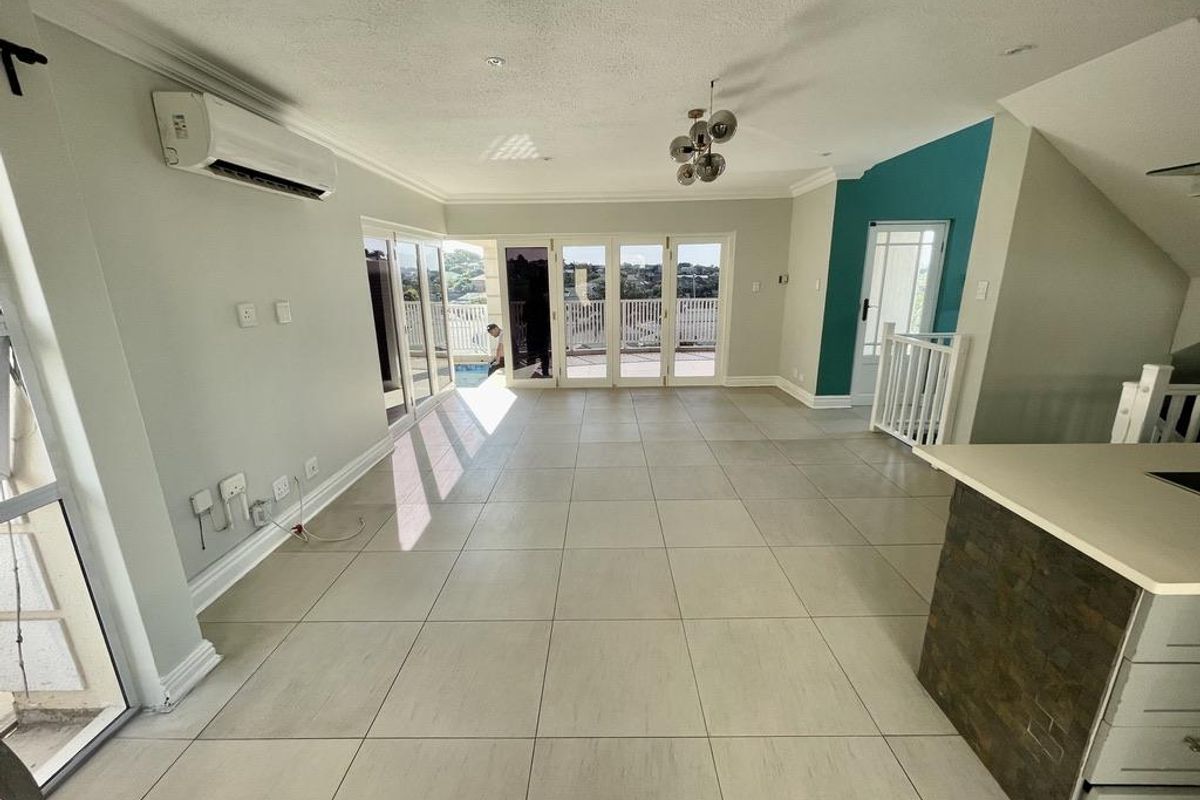 Hendra - Stylish Renovated Duplex in Secure Ilala Ridge Estate | Splash Pool, Study & Triple Garage - Photo 3