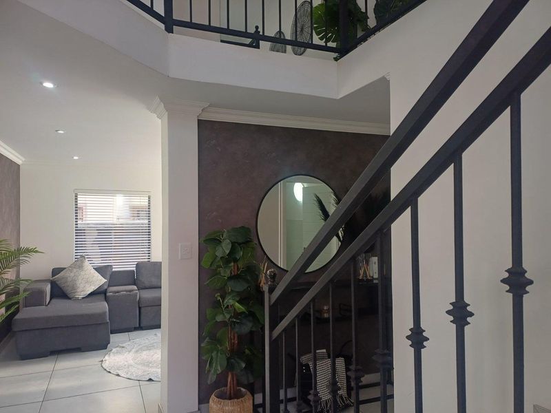 Stylish Double-Storey Cluster with Granny Flat & Poolside Charm - Photo 3