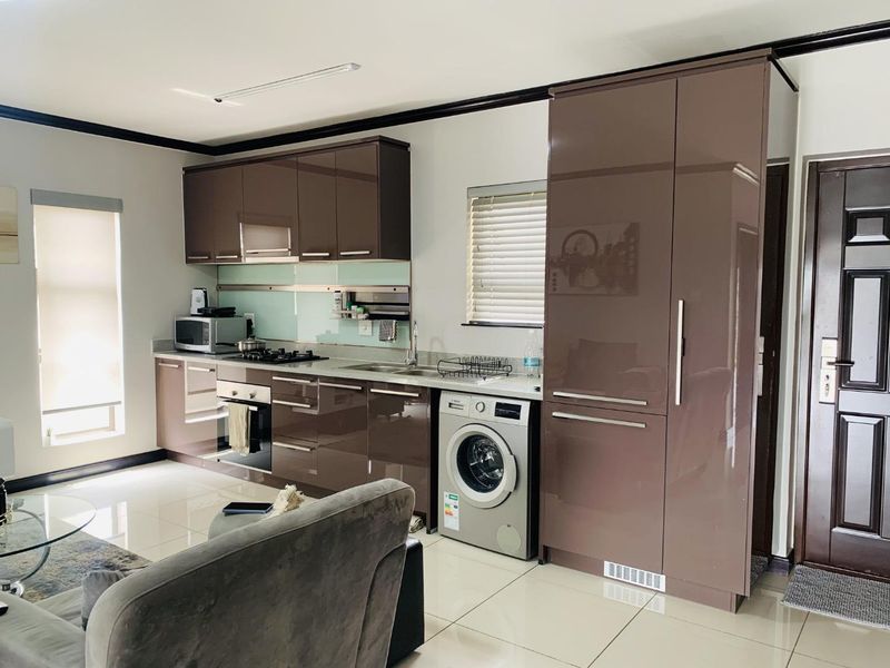 Modern 1-Bed Apartment in Palm View Estate - Photo 5