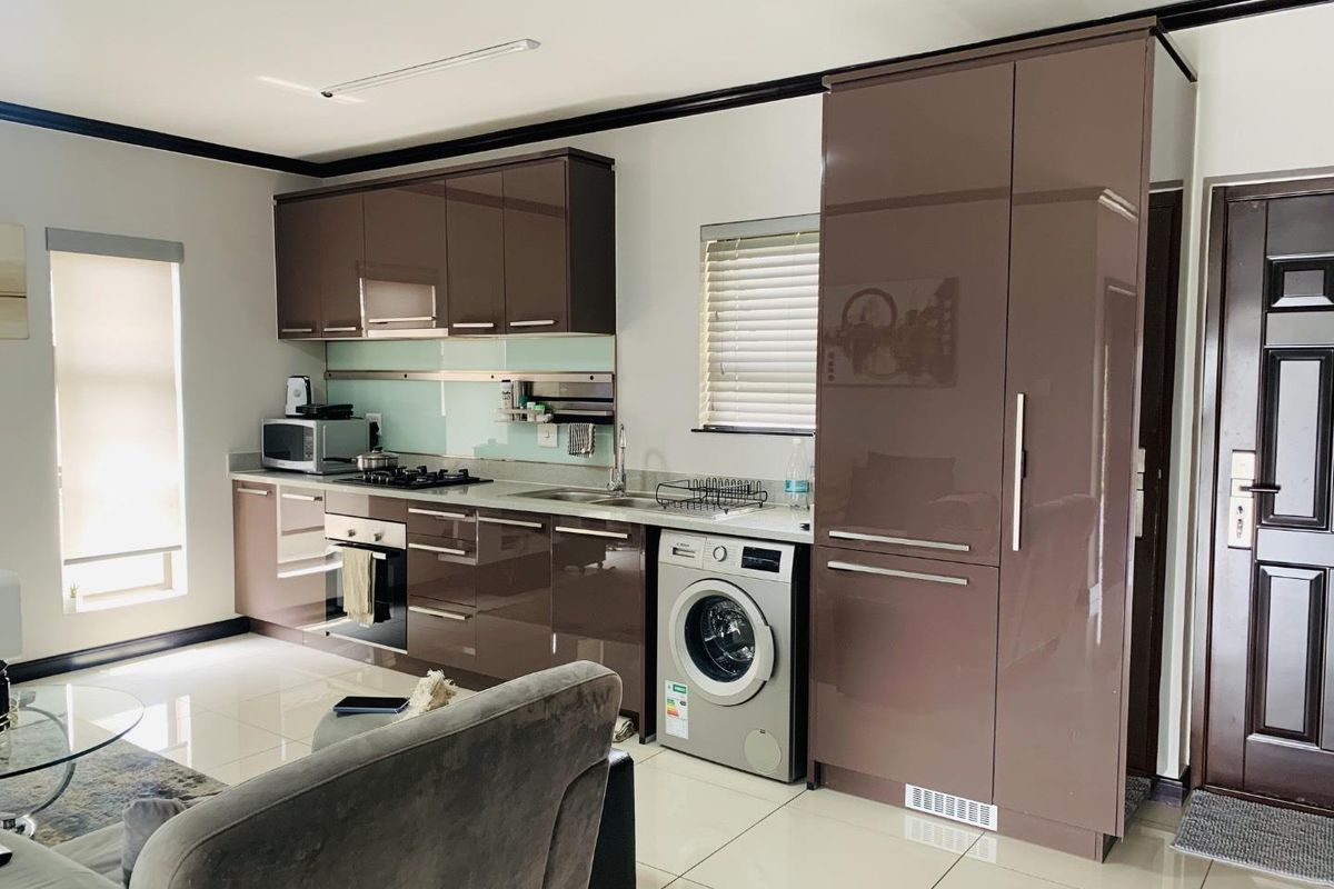 Modern 1-Bed Apartment in Palm View Estate - Photo 5