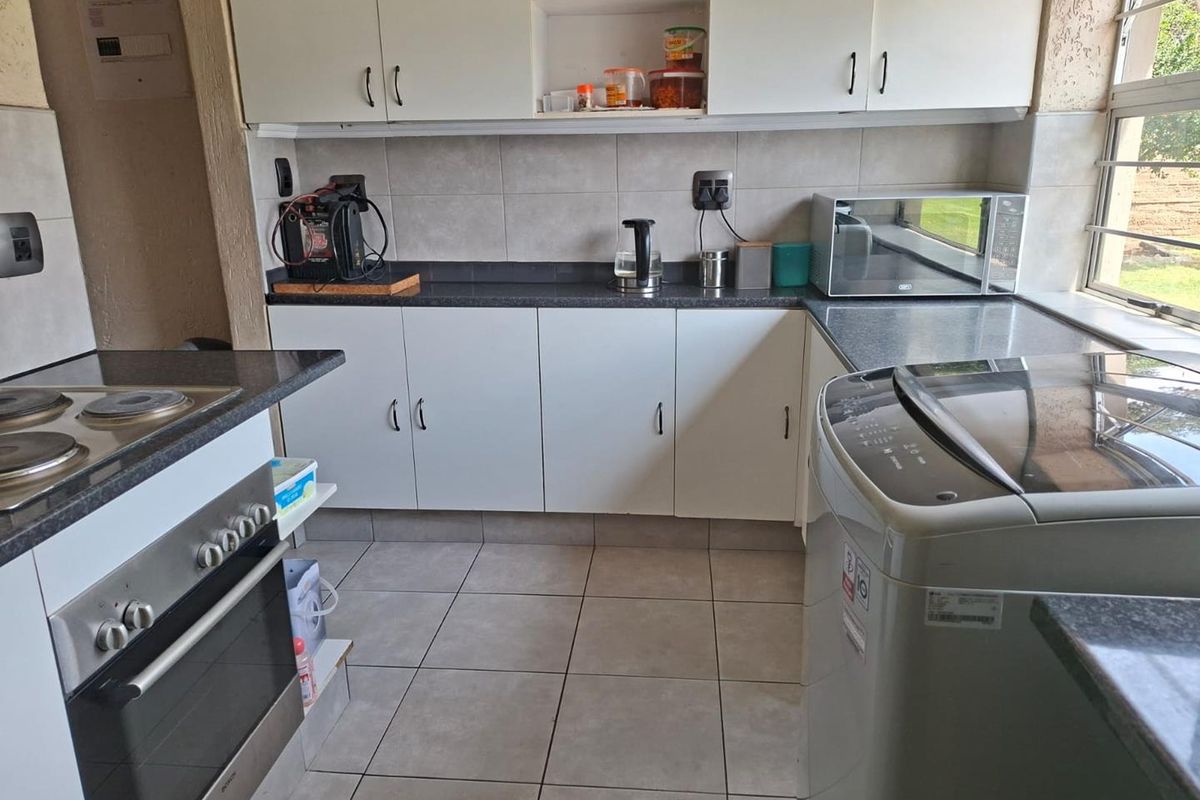 Corner Stand in Fairly Busy Road - Photo 2