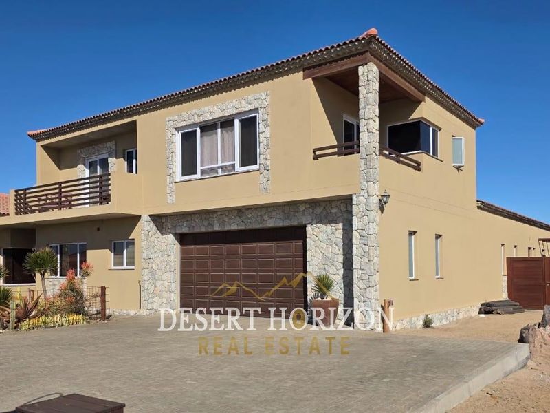 Erongo , Rossmund | Charming Double-Storey Home with Modern Amenities and Scenic Surroundings - Photo 1