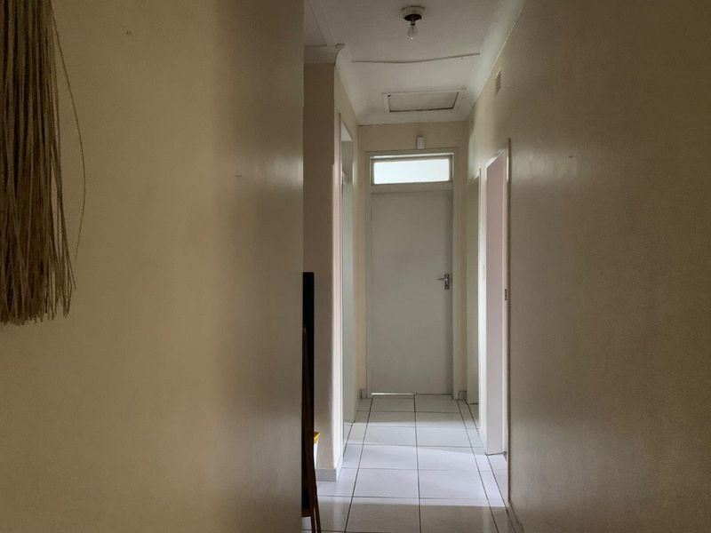 **Charming 3-Bedroom Home with Income Potential in a Tranquil Neighborhood** - Photo 6