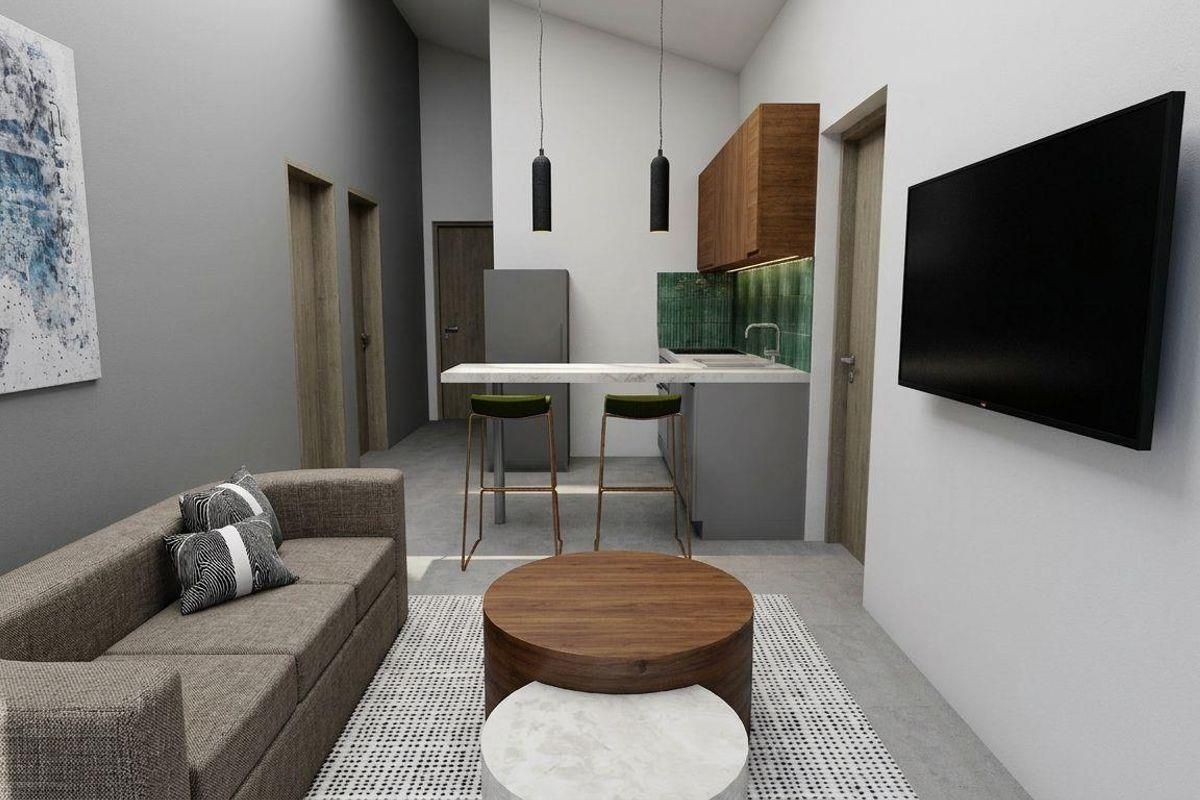 Modern open-plan living area featuring a compact kitchen with stone countertops, tiled splashback, and high vaulted ceilings.