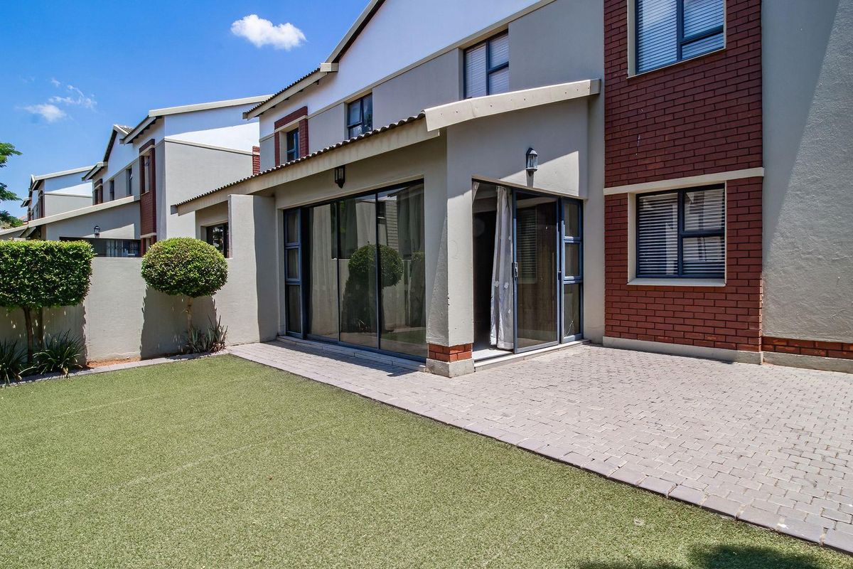 . "Unwind in Style: Elegant Home with Private Garden Bliss! - Photo 3