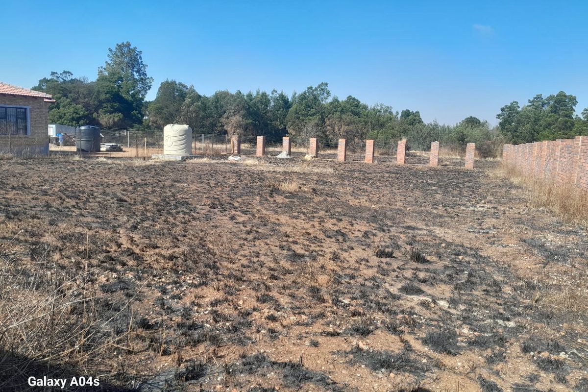 Walled Vacant Stand Inside Boomed Area With a Borehole Dug - Photo 4