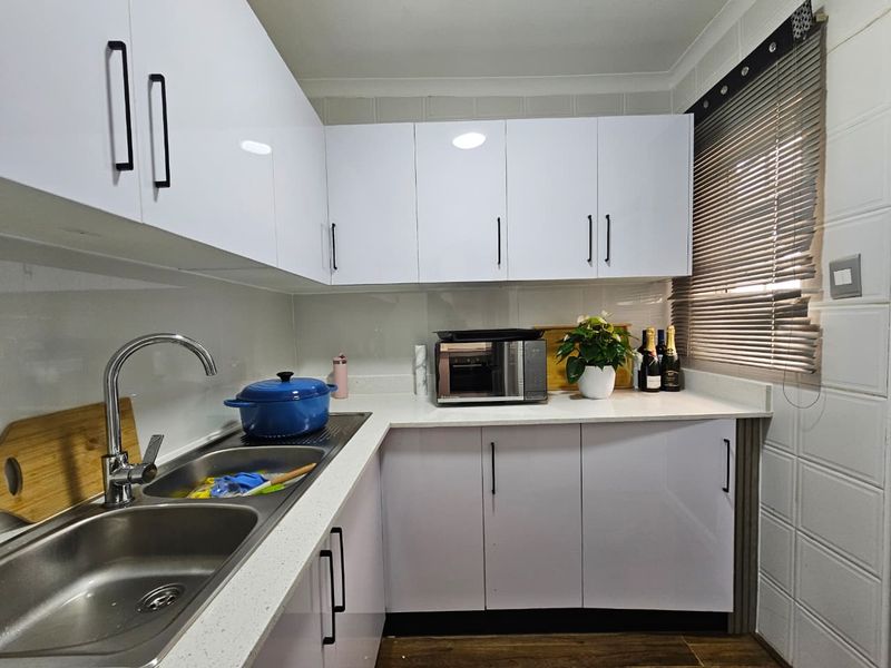 Discover easy coastal living in this charming 2-bedroom simplex in Meer en See - Photo 4