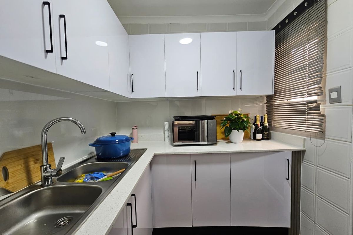 Discover easy coastal living in this charming 2-bedroom simplex in Meer en See - Photo 4