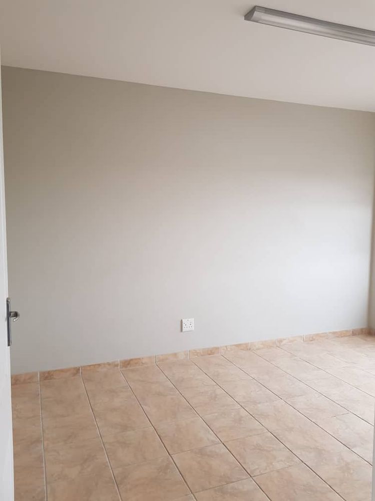 Enclosed office and reception area in front