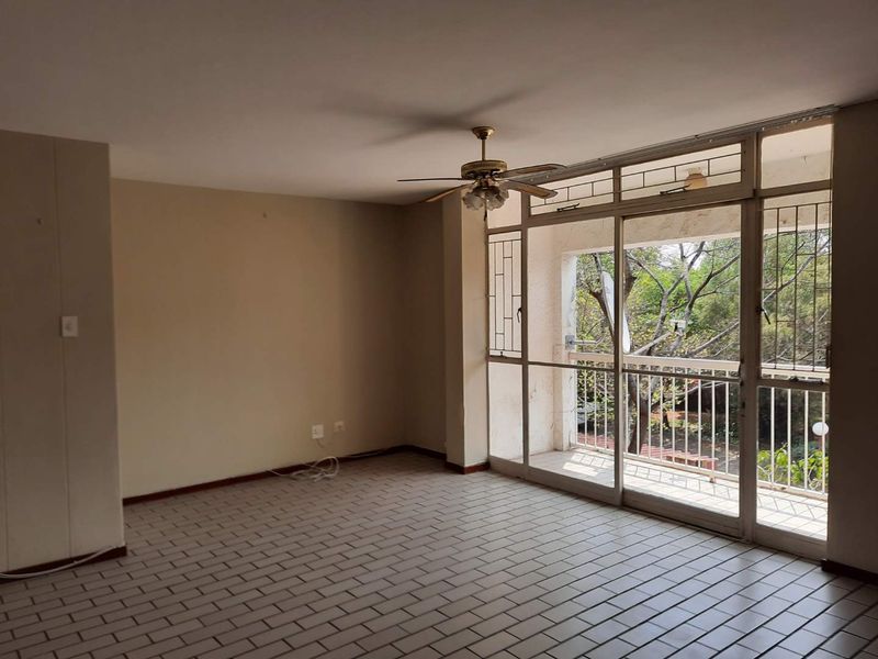 Enjoy Comfort & Security in This Neat 2-Bed Apartment - Photo 2
