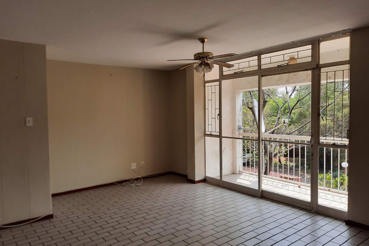 Enjoy Comfort & Security in This Neat 2-Bed Apartment - Photo 2