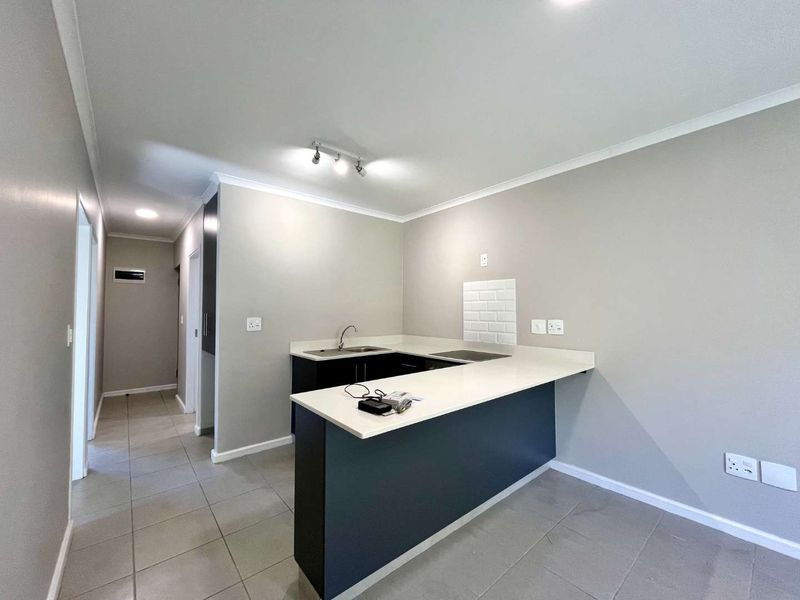Ground-Floor 2-Bedroom Apartment with Private Garden in The Woods Estate - Photo 7