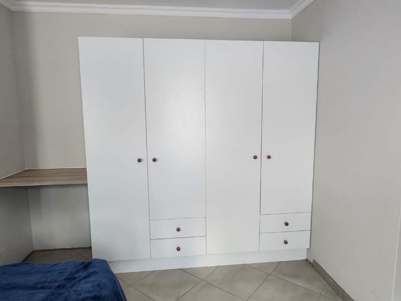 Immaculate Design Meets Modern Comfort in Your New Home - Photo 9