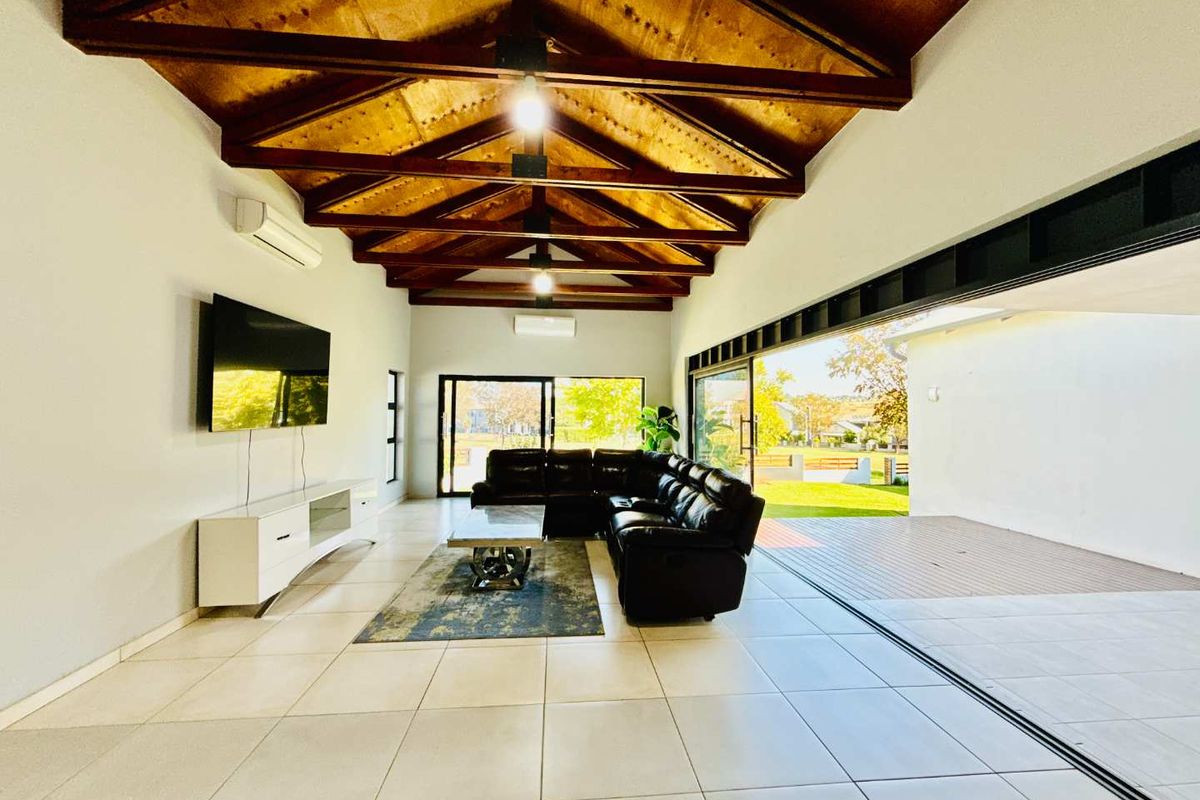 Modern Single-Level Family Home on the Green Belt in Copperleaf Golf Estate - Photo 5