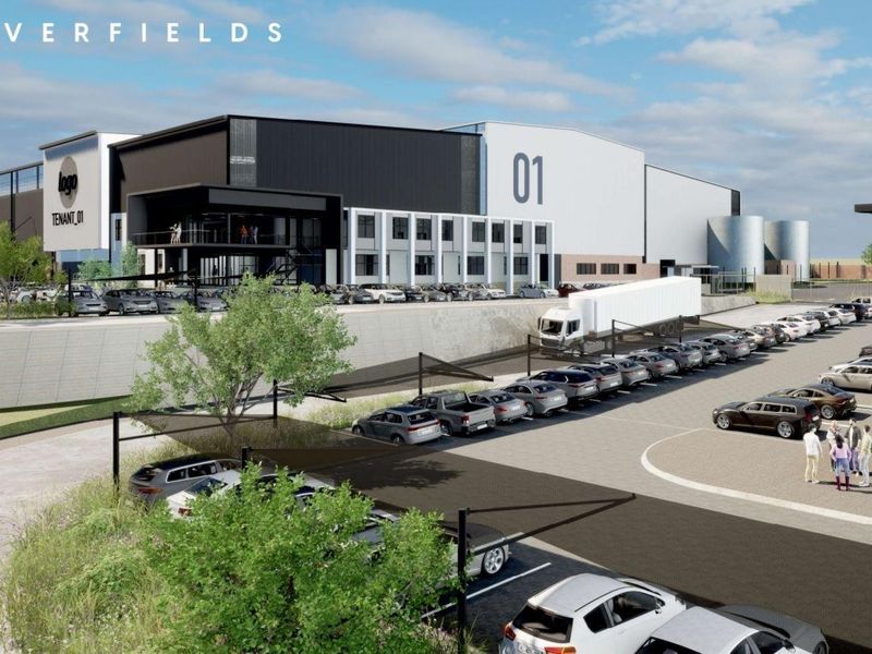 A professional architectural rendering of a modern industrial warehouse facility featuring extensive parking, loading bays, and contemporary building design.
