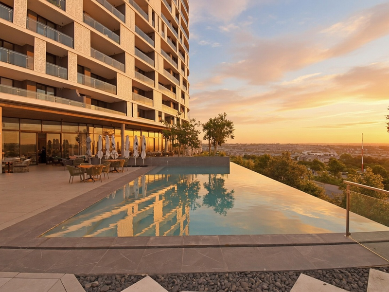 Luxury Ground-Floor Living with Expansive Patio at Ellipse Waterfall - Photo 2