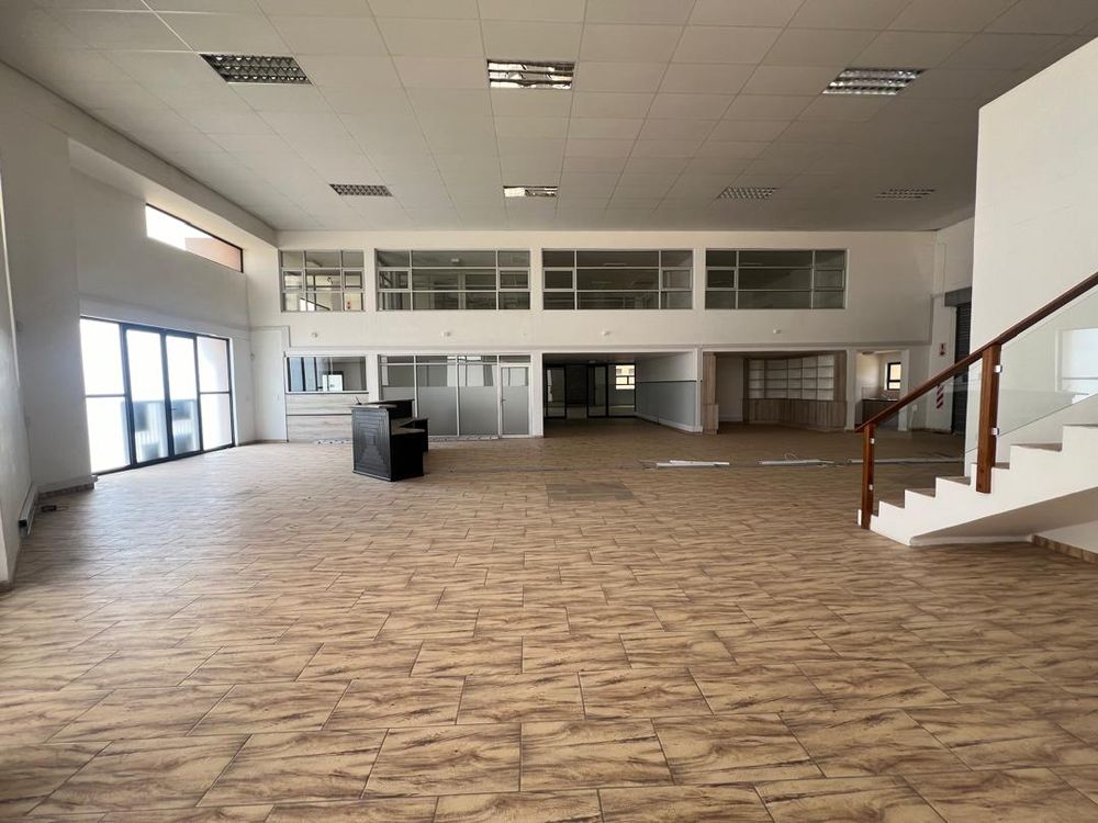 Main entrance reception area, offices and upstairs entertainment area