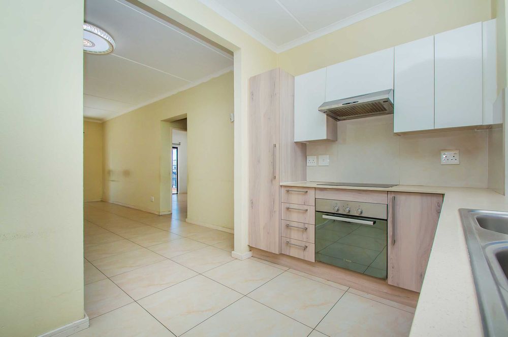 Modern wrap kitchen with ceaserstone