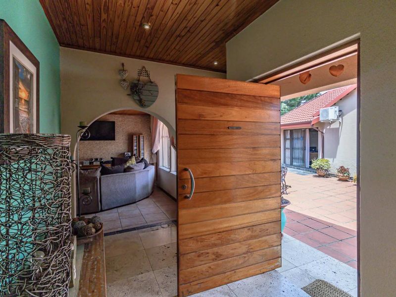 4-Bedroom Family Home with Modern Amenities and Entertainment Features - Photo 9