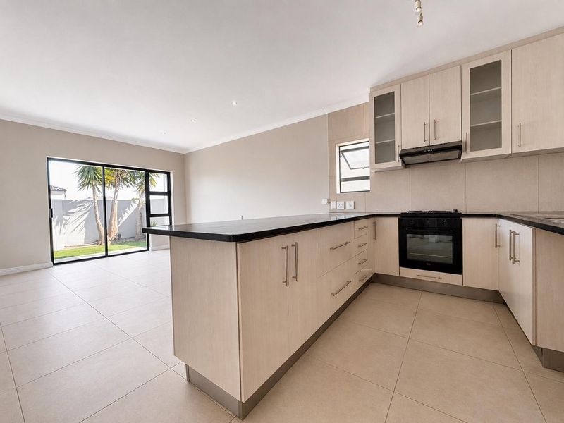 Modern Three-Bedroom Home in Parklands North - Photo 2