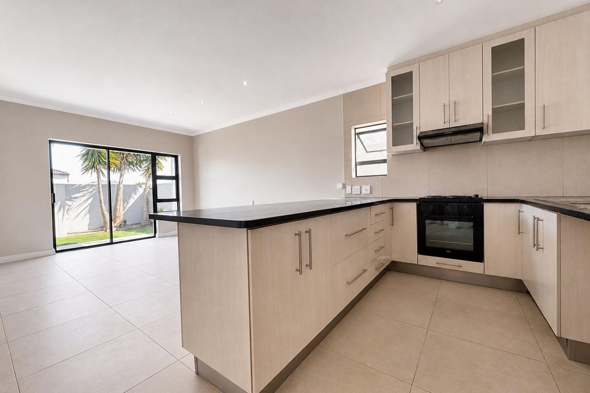 Modern Three-Bedroom Home in Parklands North - Photo 2