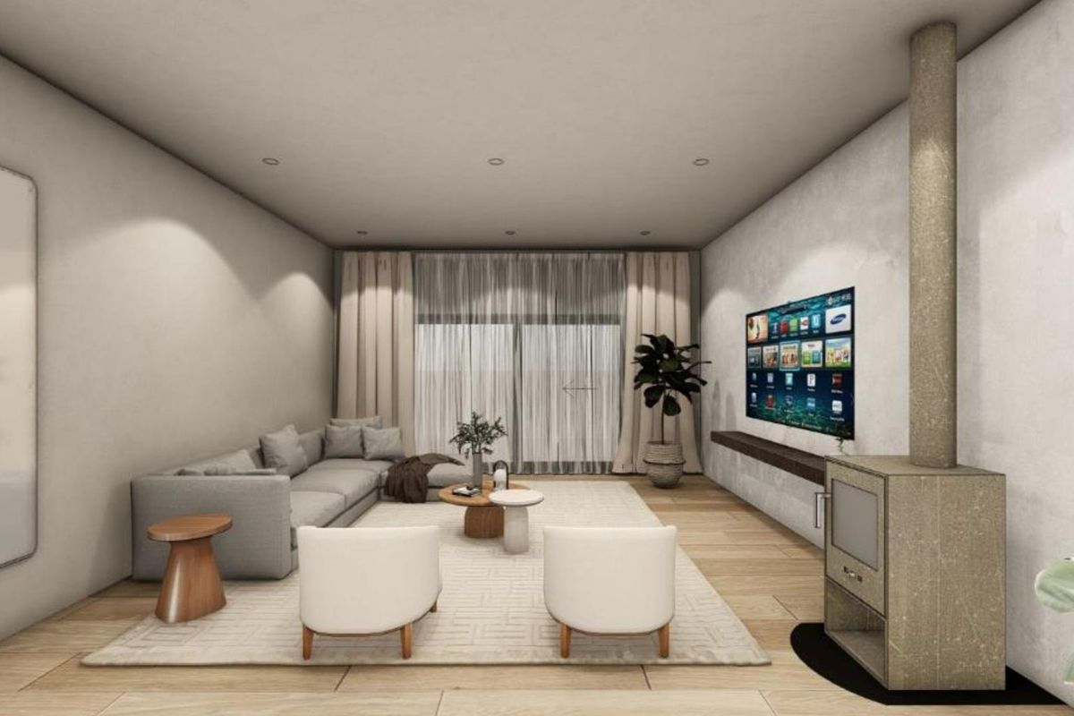 A modern, minimalist living room featuring light wood flooring, a sleek fireplace, and large sliding glass doors leading to an outdoor area.