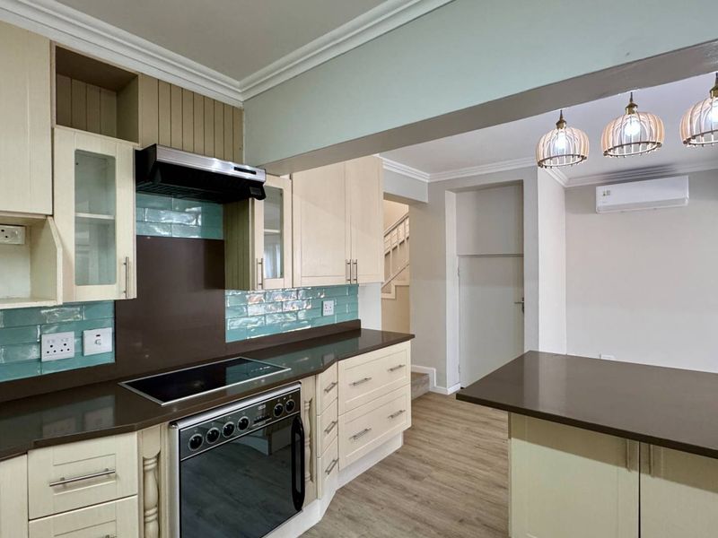 Spacious Corner Townhouse with Modern Family Living - Photo 10