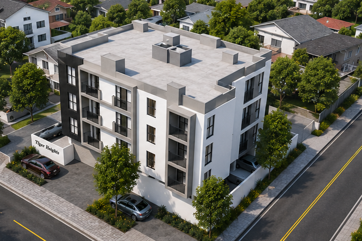 Aerial view of Tiger Heights apartment complex featuring a modern multi-story building with balconies, flat roof, and paved parking area.