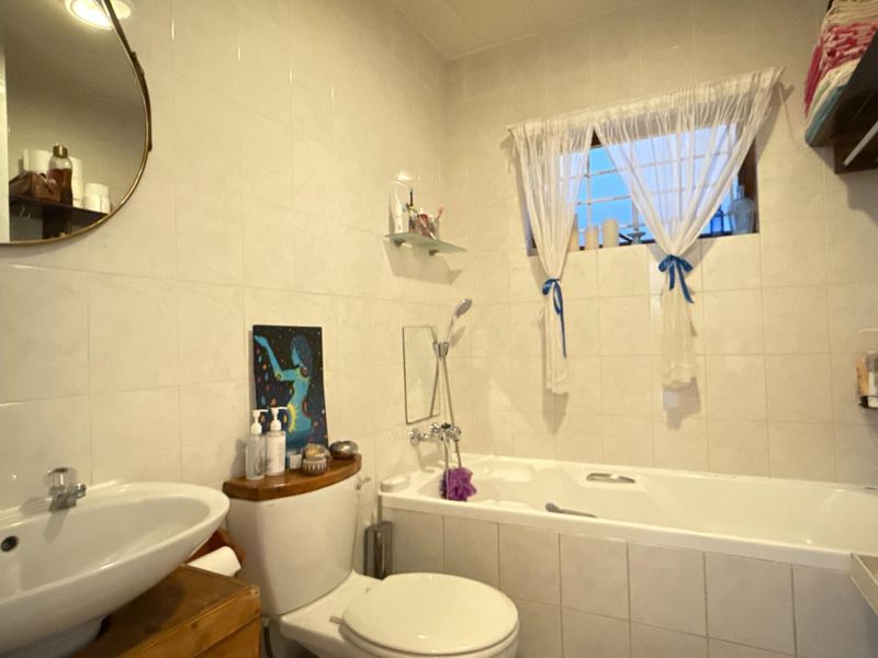 Charming Ground-Floor Gem: Convenience & Style Await! - Photo 8