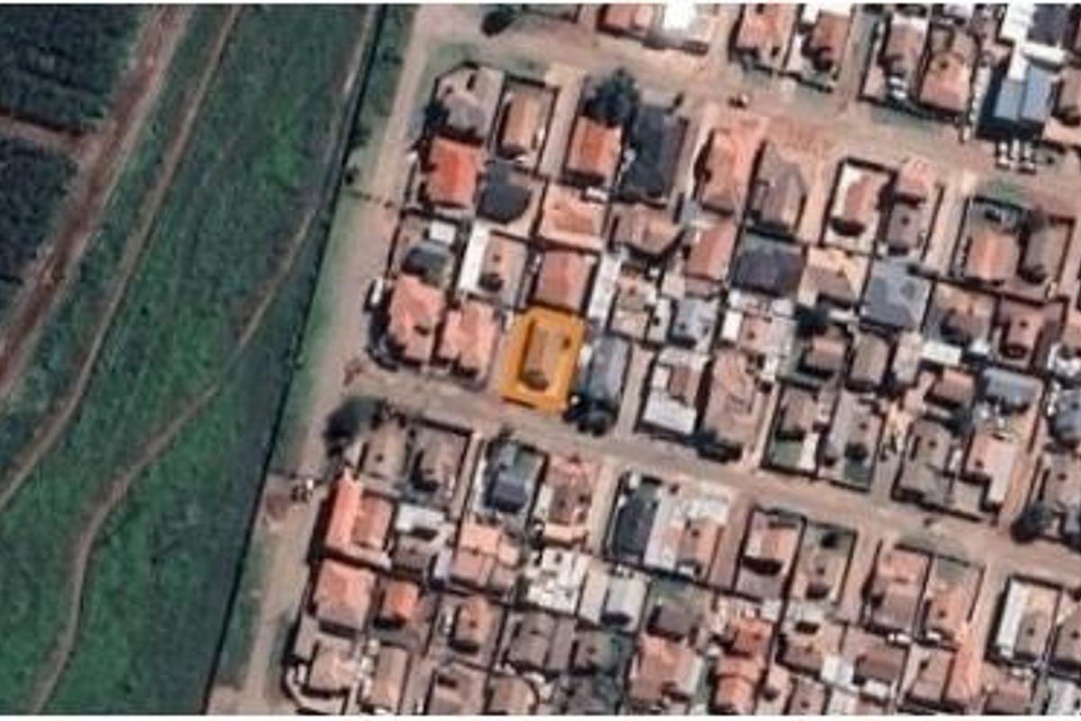 An aerial view of the residential property highlighted within the surrounding neighborhood context.