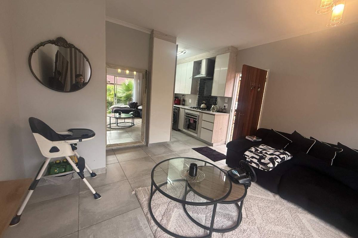 Modern, Move-In Ready Home with Solar – Secure Complex Living at Its Best! - Photo 4