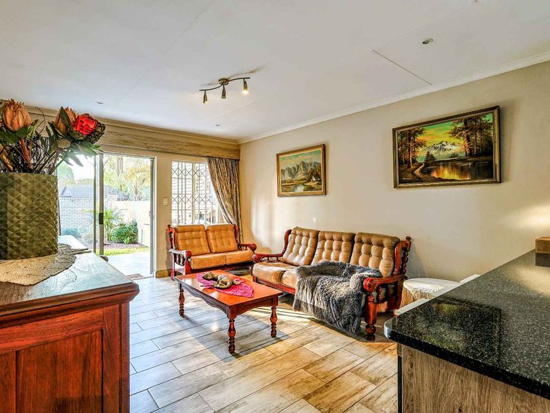 Elegant 3-Bedroom Modern Home with Solar in a Exquisite Moreleta Park Estate - Photo 7