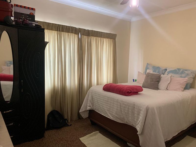 **Charming 3-Bedroom Home with Income Potential in a Tranquil Neighborhood** - Photo 10