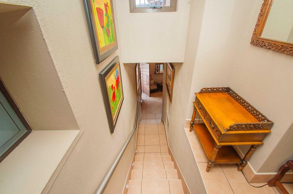 Stairwell landing between entrance and upstairs home