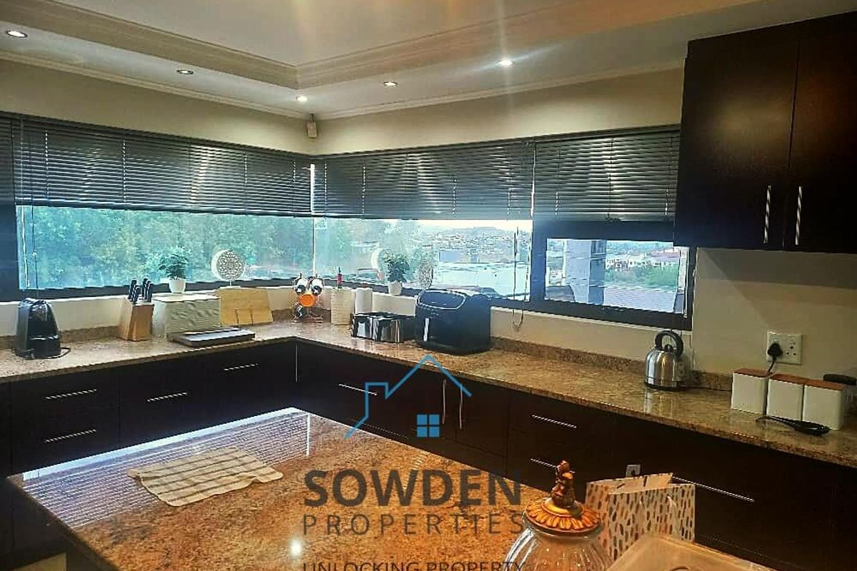 Scenic City Views & Infinity Pool: Your New Luxury Home! - Photo 4