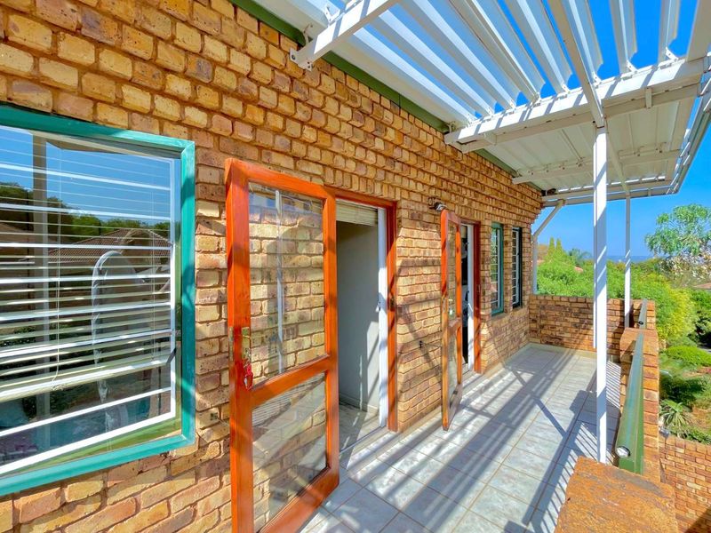**Charming 3-Bedroom Home with Separate Flatlet, Backup Power, and Low Levies in Faeriedale Security Village, Faerie Glen** - Photo 6