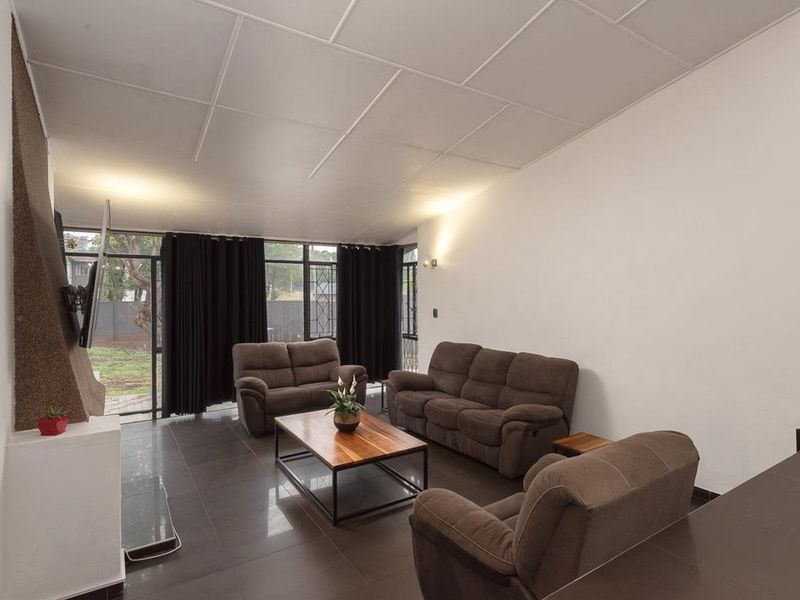 Secure Family Living with Pool and Spacious Garaging - Photo 8