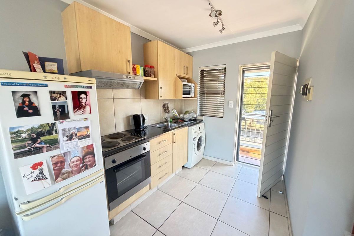 Convenient Location! Secure 2-Bedroom Apartment for Sale - Photo 3