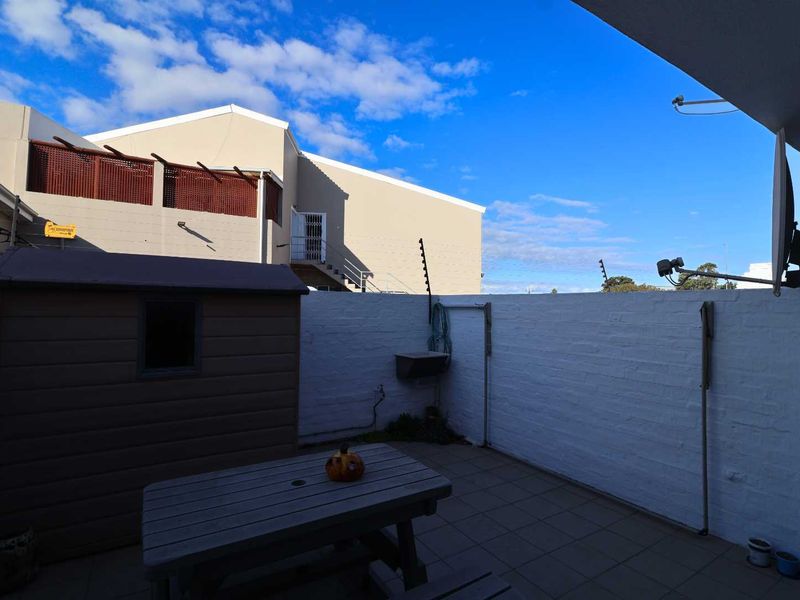 Coastal Comfort Meets Smart Investment! - Photo 3